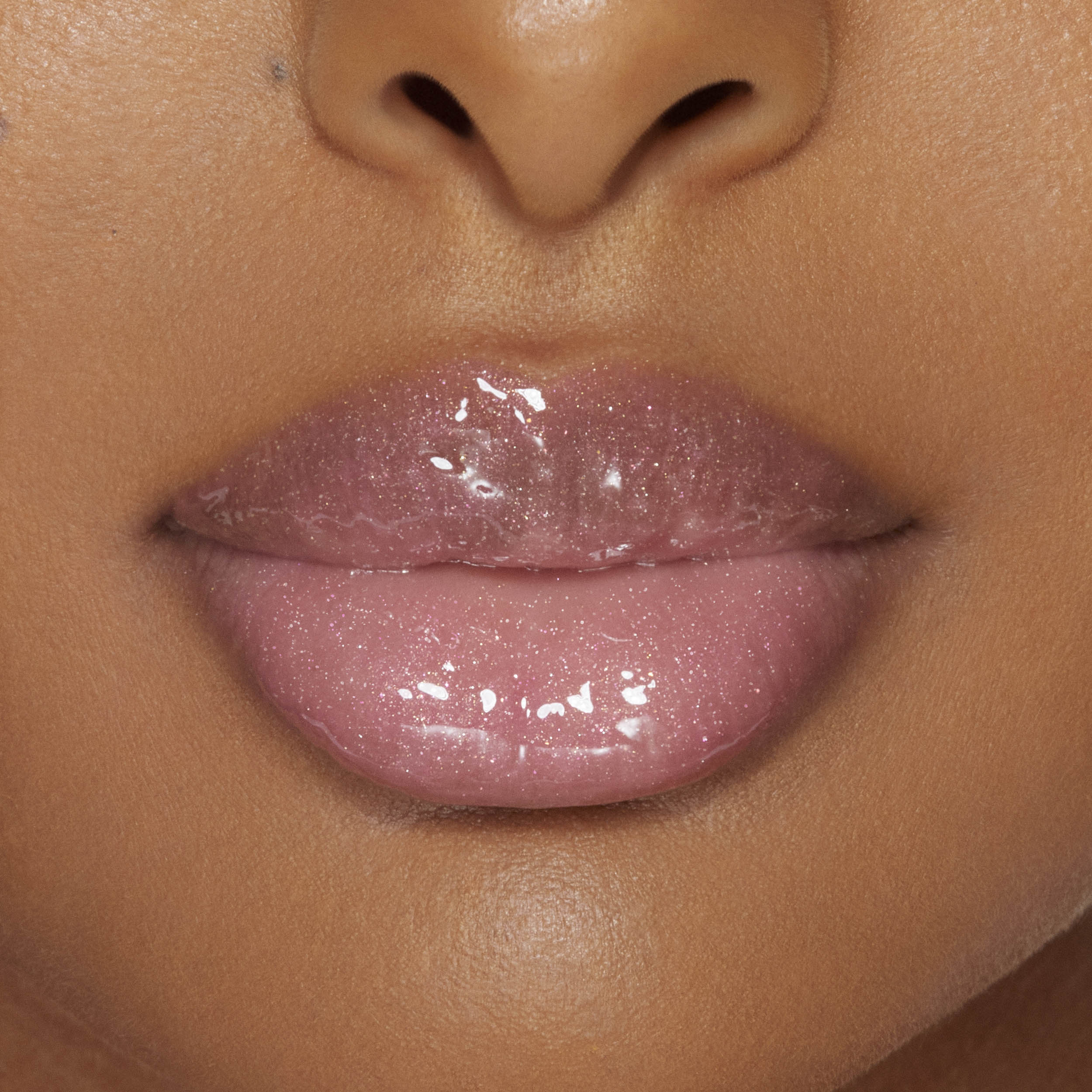 Plumping Gloss for fyldigere, ultra-skinnende våt leppe-look