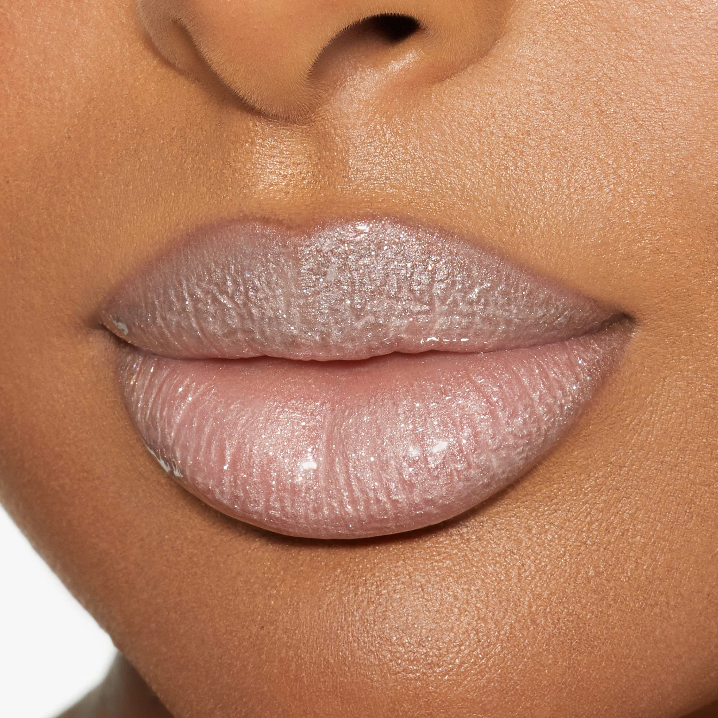 Brillo de labios de alto brillo con destellos multidimensionales