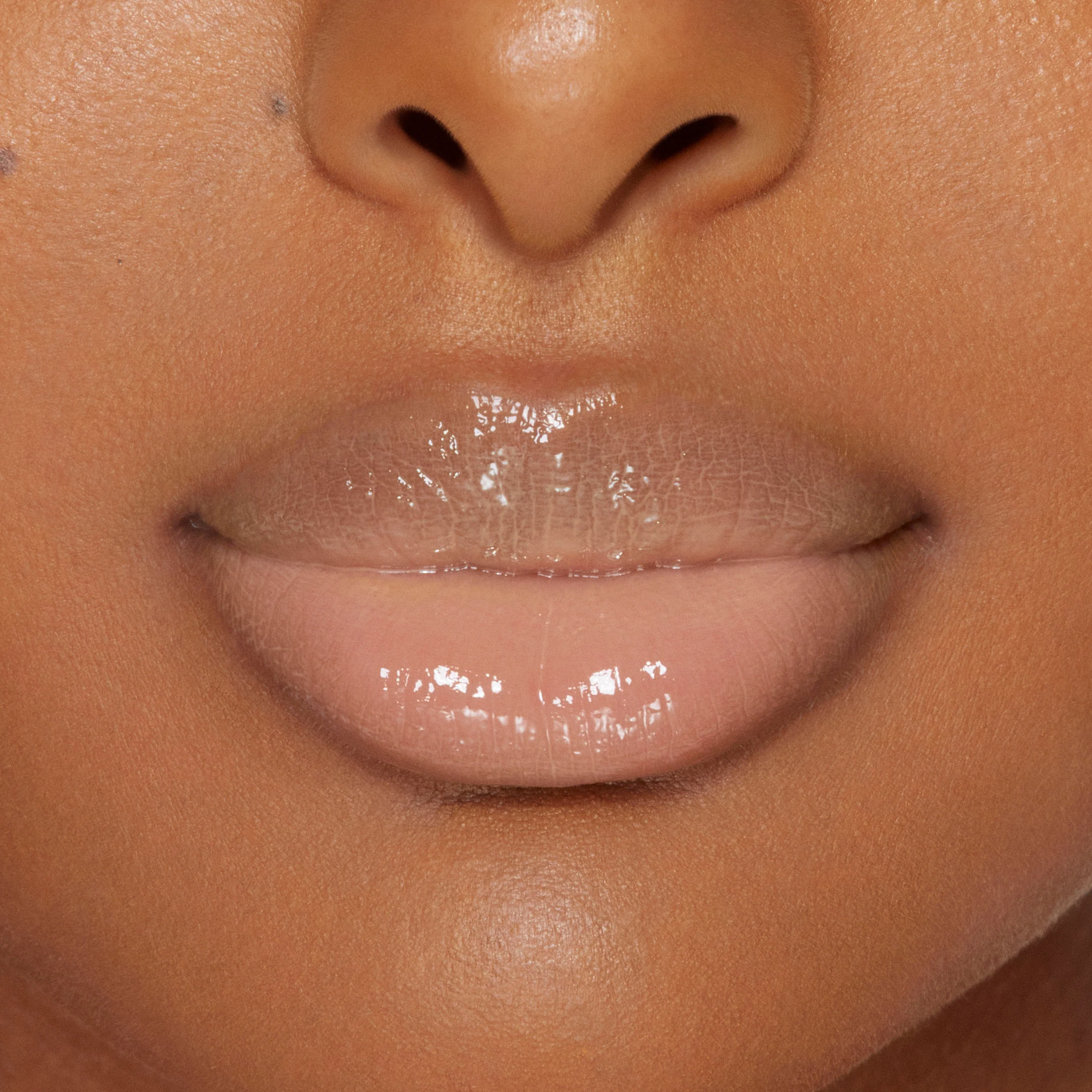 Plumping Gloss for fyldigere, ultra-skinnende våt leppe-look