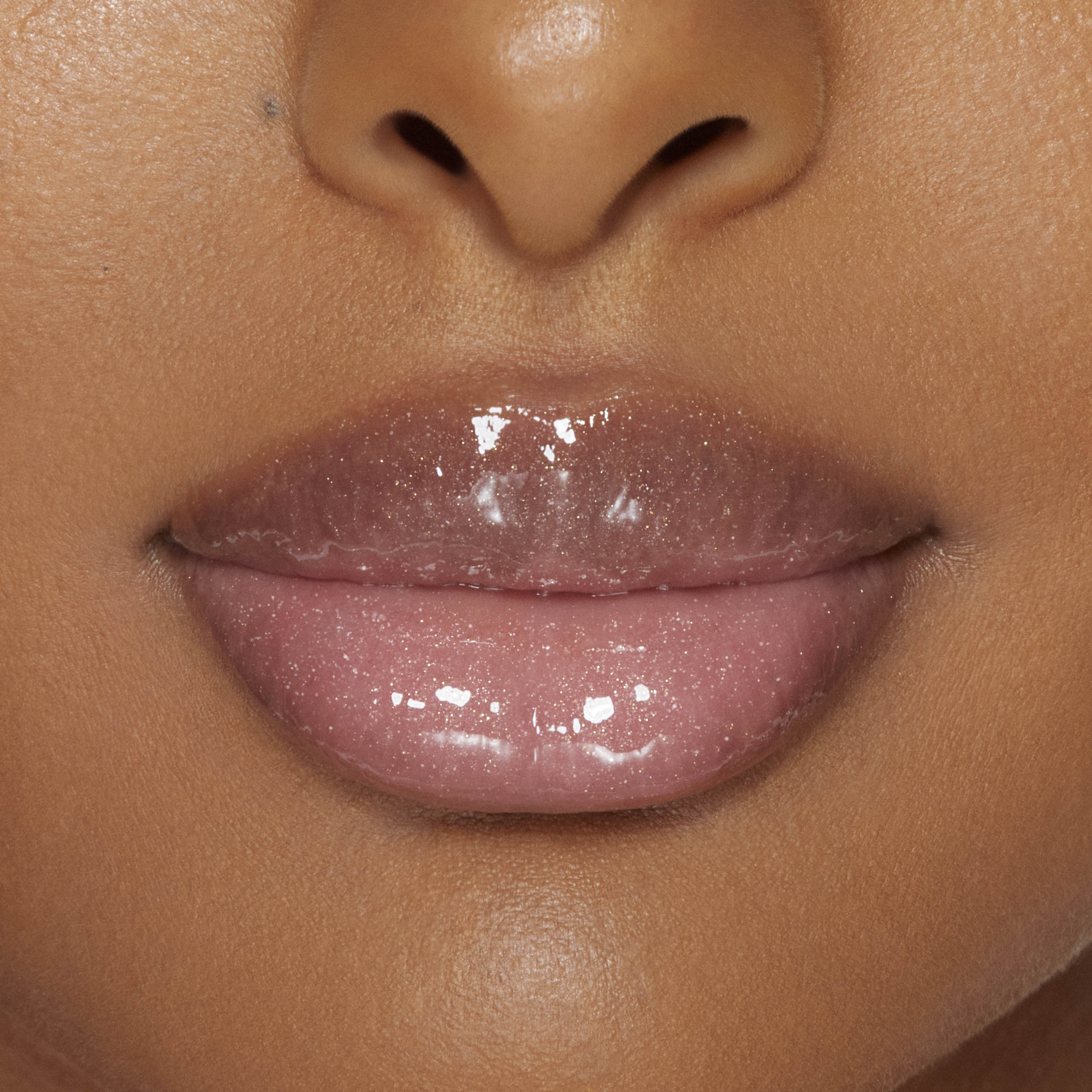 Plumping Gloss for fyldigere, ultra-skinnende våt leppe-look