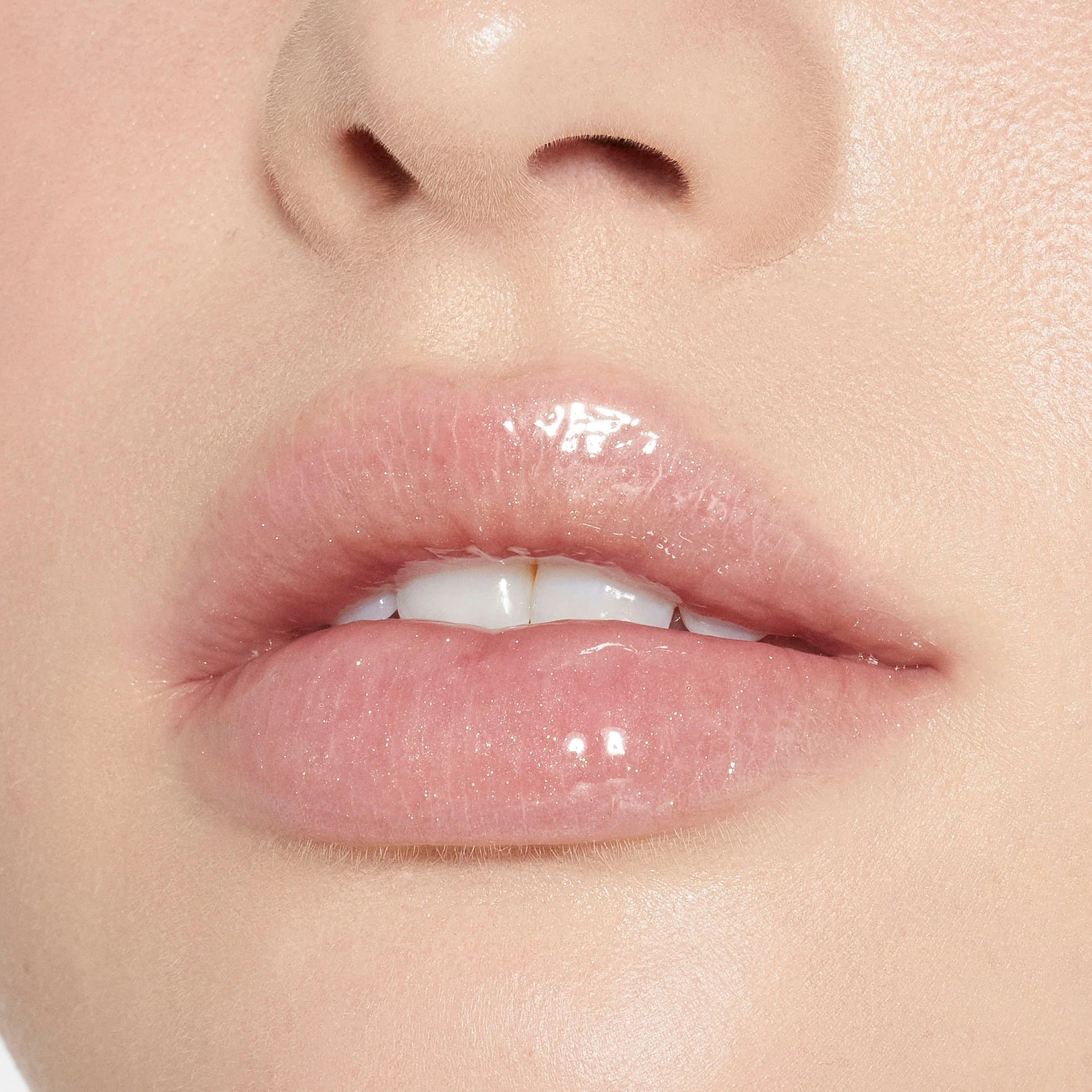 Brillo de labios de alto brillo con destellos multidimensionales