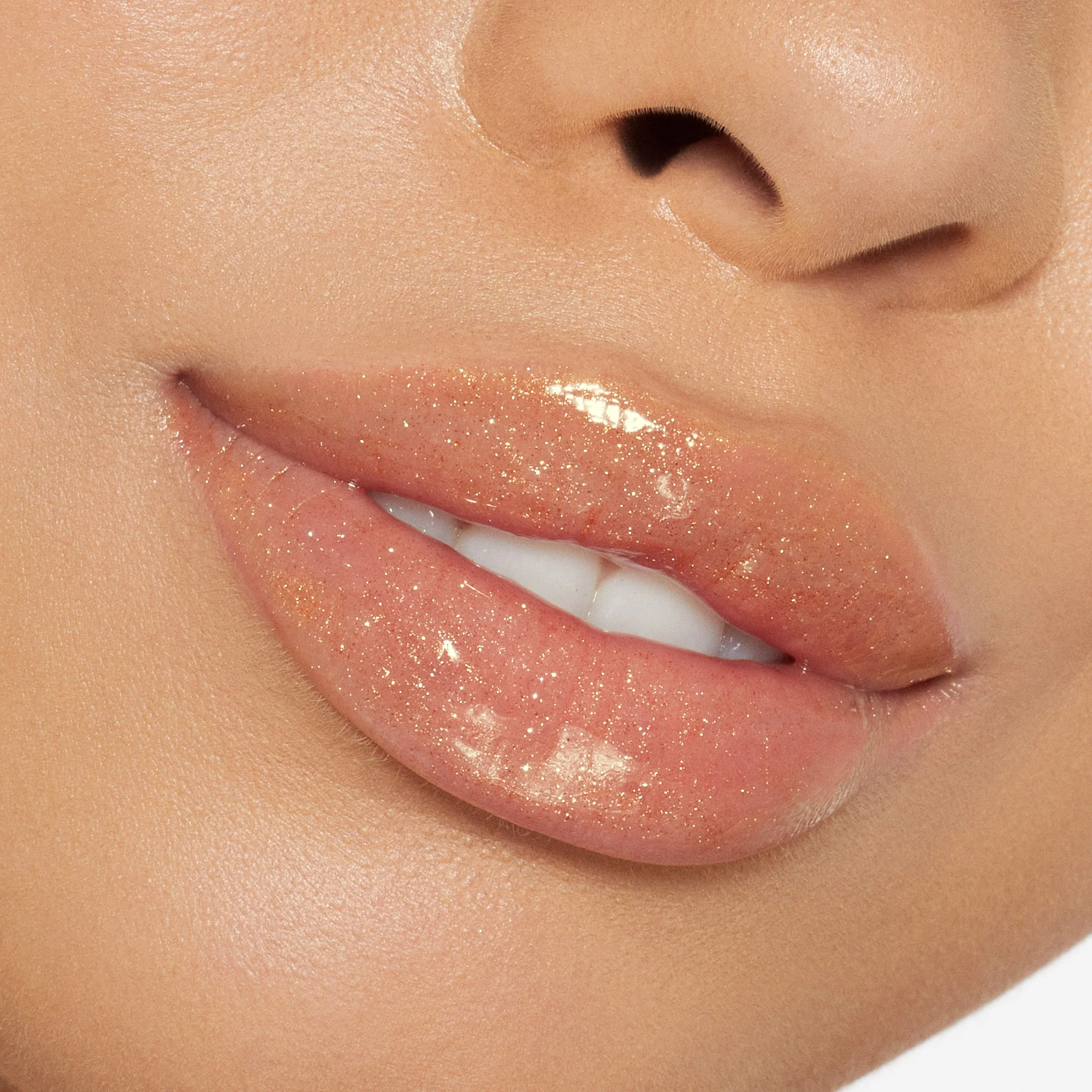 Brillo de labios de alto brillo con destellos multidimensionales