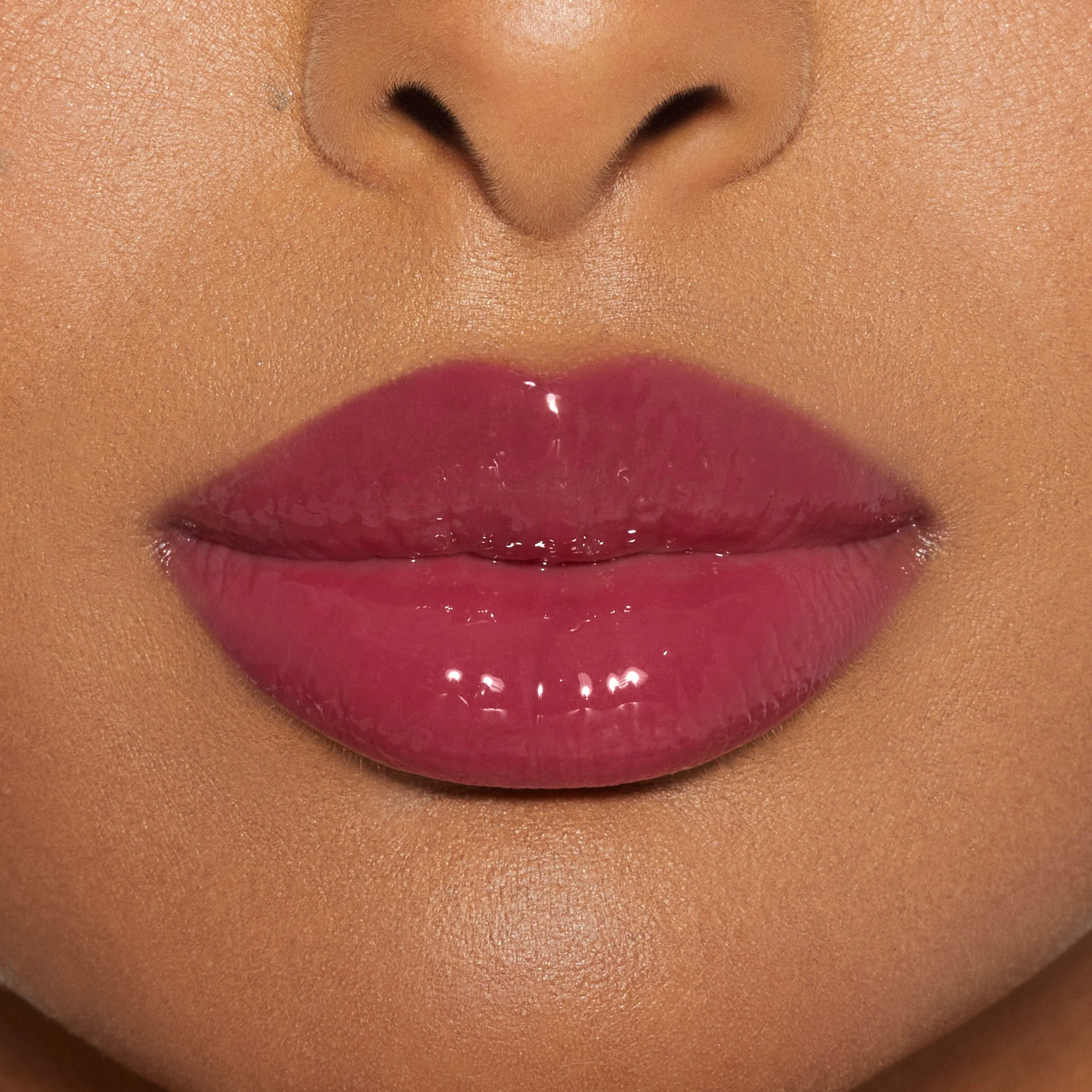 Brillo de labios de alto brillo con destellos multidimensionales
