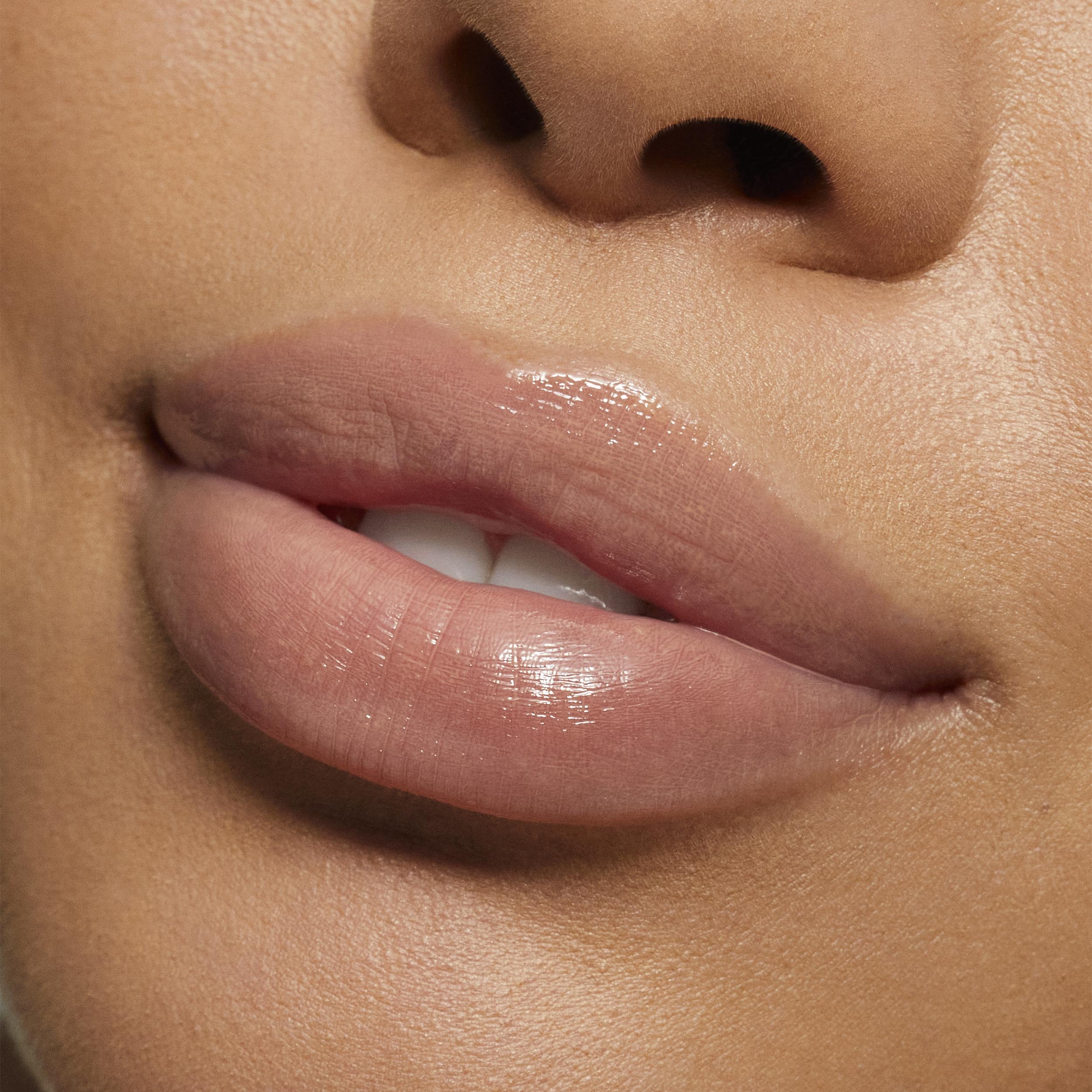Brillo de labios de alto brillo con destellos multidimensionales