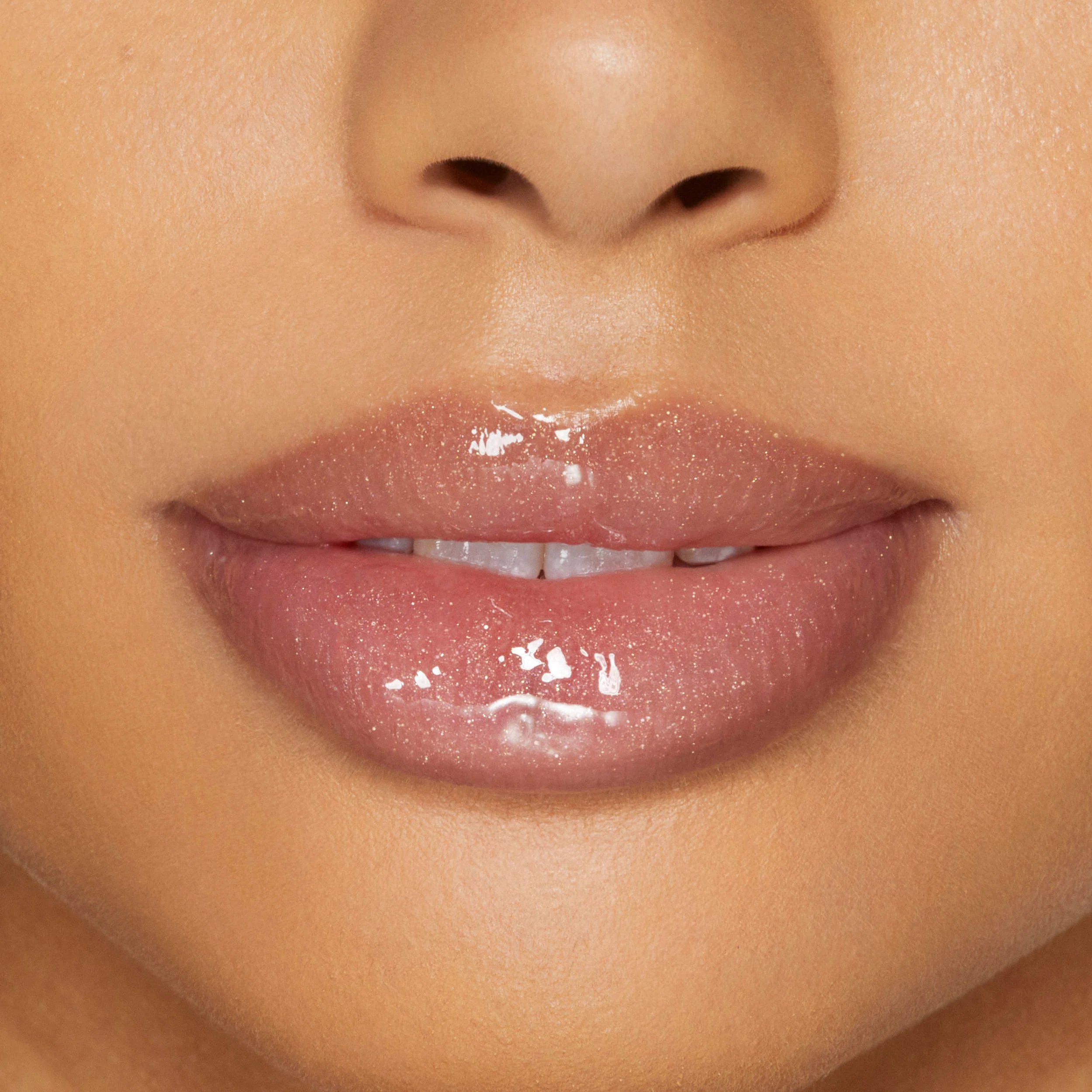 Plumping Gloss for fyldigere, ultra-skinnende våt leppe-look