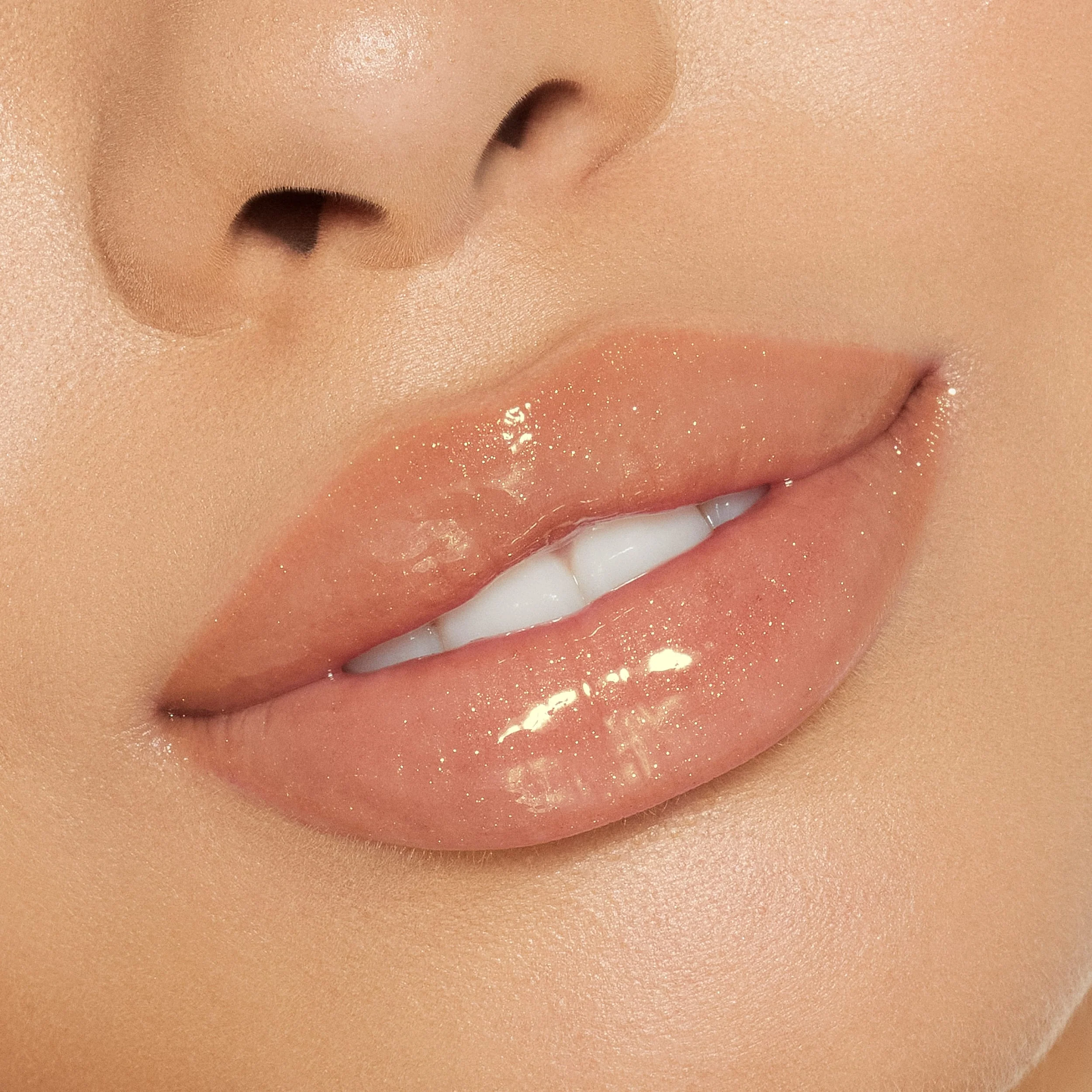 Brillo de labios de alto brillo con destellos multidimensionales