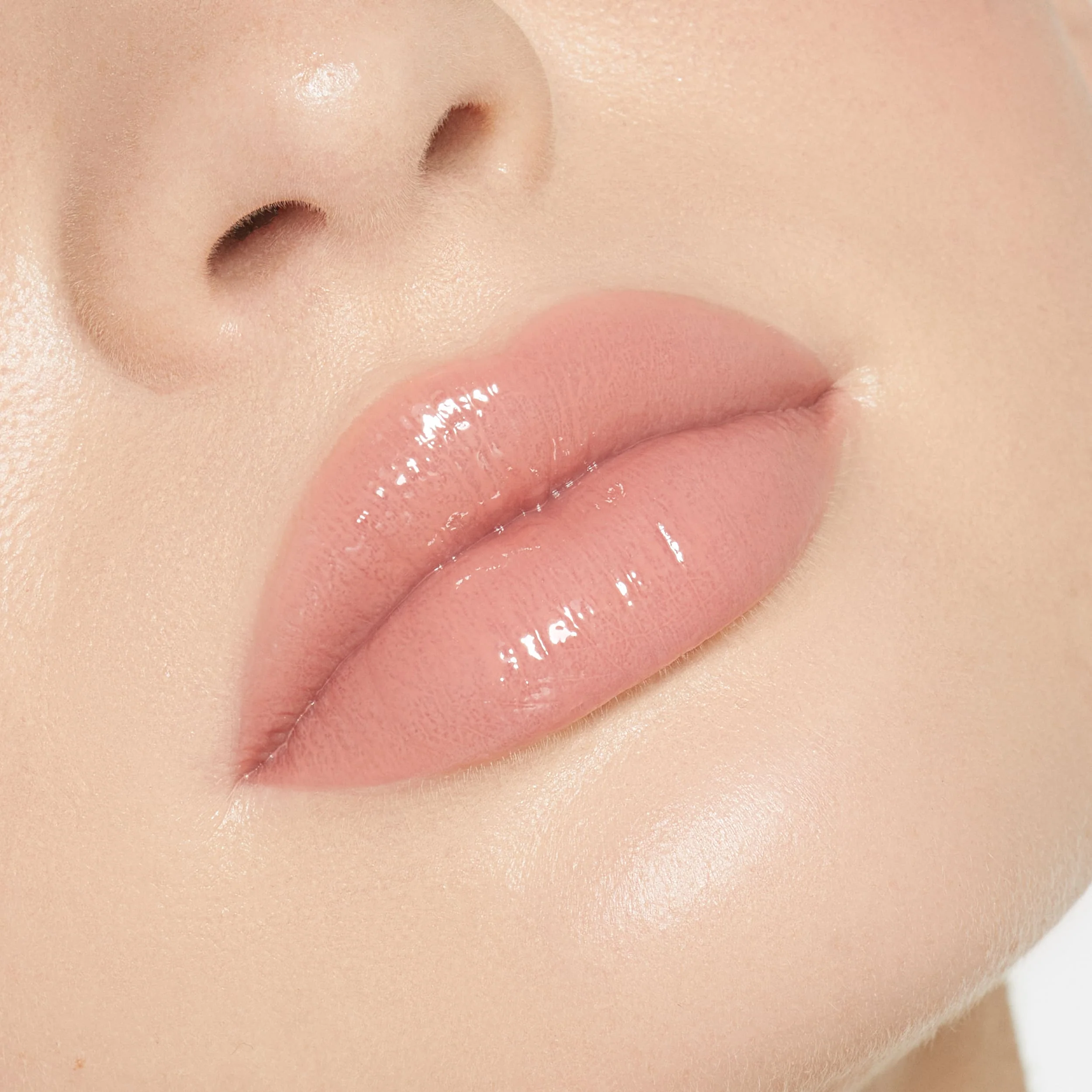Brillo de labios de alto brillo con destellos multidimensionales